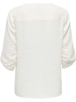 Blouse blanche unie avec une coupe fluide et des manches 3/4