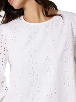 Blouse blanche unie pourvue d'une coupe droite et d'un col rond