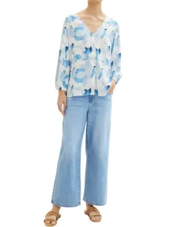 Blouse bleue imprimée avec une coupe droite col v et manches longues