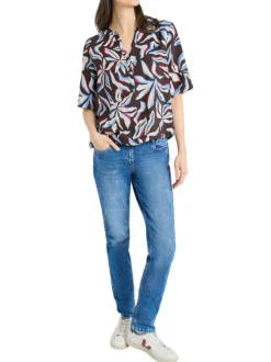 Blouse chocolat à motifs pourvue de manches courtes et d'un col tunisien