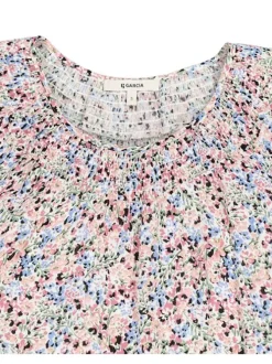 Blouse écrue liberty coupe droite avec un col rond et des manches ballons