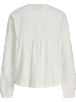 Blouse en coton biologique blanche pourvue d'un col v et de manches longues