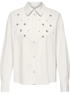 Blouse en coton blanche unie avec un col français et une fermeture boutonnée