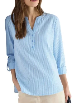 Blouse en coton mélangé bleue à rayures pourvue d'un col tunisien