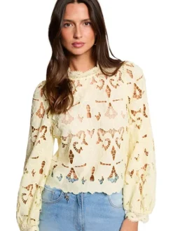 Blouse jaune unie pourvue d'une coupe droite et d'un col montant