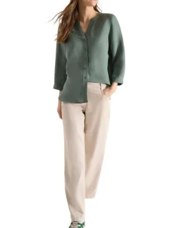 Blouse kaki unie avec une coupe droite et des manches 3/4 pourvu d'un bouton