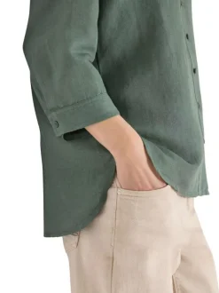 Blouse kaki unie avec une coupe droite et des manches 3/4 pourvu d'un bouton