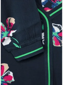 Blouse marine fleurie à col v et à manches longues avec liserés vert