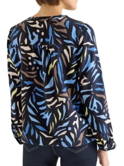 Blouse marine à motifs pourvue de manches longues et d'un col tunisien