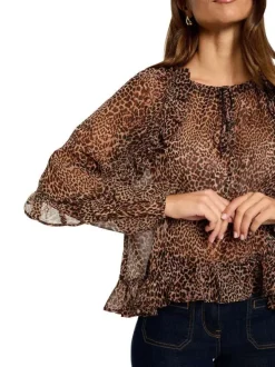 Blouse à motifs léopards avec une coupe droite et un col rond