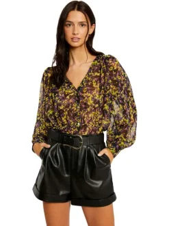 Blouse multicolore moucheté à coupe péplum col v et à manches longues