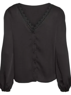 Blouse noire en dentelle à coupe ample col v et à manches longues