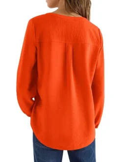 Blouse orange unie pourvue d'une coupe droite et d'un col tunisien