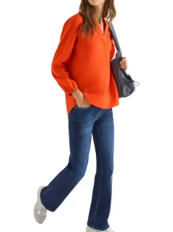 Blouse orange unie pourvue d'une coupe droite et d'un col tunisien