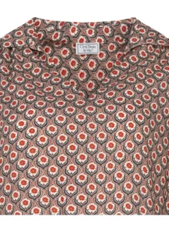 Blouse rouge fleurie à coupe droite col v et à manches longues