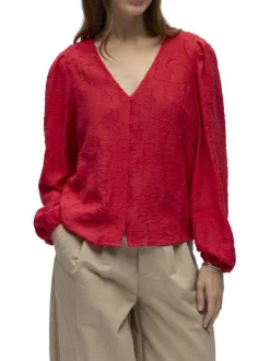 Blouse rouge unie pourvue d'une coupe droite et de manches longues
