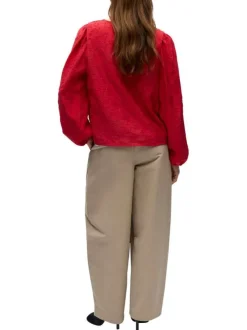 Blouse rouge unie pourvue d'une coupe droite et de manches longues