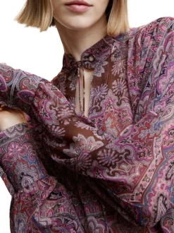 Blouse violette imprimé avec une coupe droite fluide et un col montant
