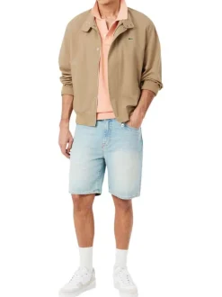 Blouson beige à coupe ajustée pourvu d'un col à boutons pression