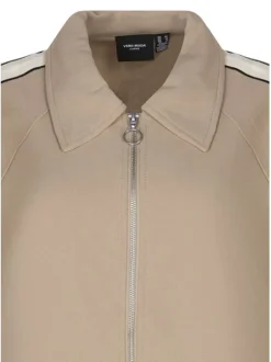 Blouson beige uni avec une coupe droite et des manches longues