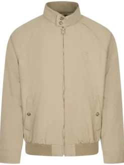 Blouson beige uni avec une coupe droite et un col montant boutonné