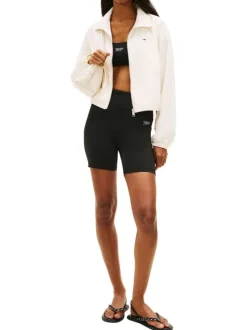 Blouson beige uni avec une coupe droite et un col montant à zip