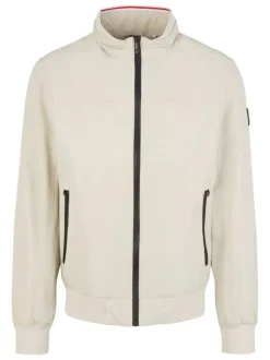 Blouson beige uni coupe droite avec un col montant et des poches latérales