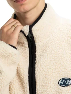 Blouson beige uni en maille effet sherpa et fermeture à glissière