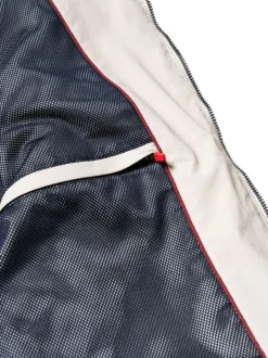 Blouson beige uni pourvu d'une coupe droite et d'un col montant