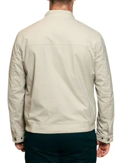 Blouson beige uni pourvu d'une coupe droite et d'un col montant
