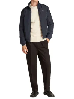 Blouson bleu marine uni avec une coupe droite et un col montant