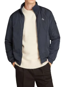 Blouson bleu marine uni avec une coupe droite et un col montant
