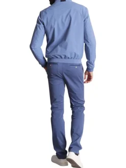 Blouson bleu uni à col montant avec des poches latérales zippées