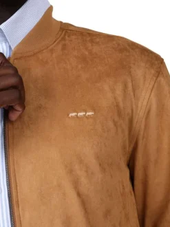 Blouson camel uni avec une coupe droite à col rond et logo iconique