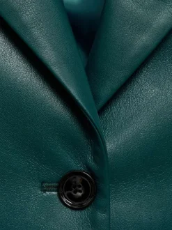 Blouson canard uni avec une coupe droite et un col à revers avec des poches