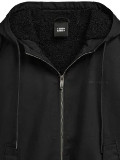 Blouson à capuche noir uni zippé à coupe droite avec le nom de la marque