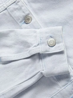 Blouson ciel en coton uni à col chemise et manches longues avec boutons argentés