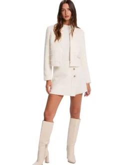 Blouson écru uni avec une coupe droite et des manches longues