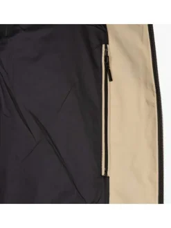 Blouson déperlant beige uni avec une coupe droite et un col montant