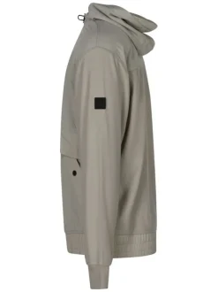 Blouson en coton beige uni avec une coupe droite et une fermeture zippée