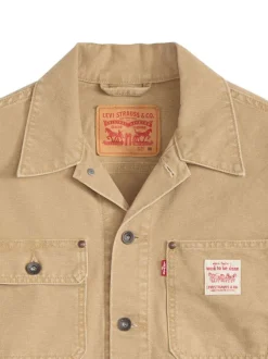 Blouson en coton beige uni avec un patch de la marque sur la poitrine
