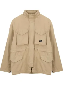 Blouson en coton beige uni à coupe ample avec un col montant