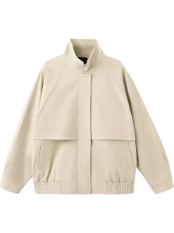 Blouson en coton beige uni pourvu d'une coupe droite et d'un col montant
