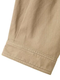 Blouson en coton beige uni pourvu d'une coupe droite et d'un col montant