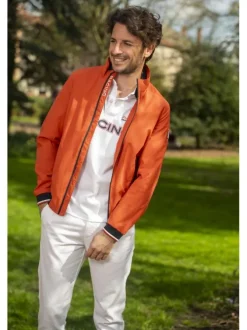 Blouson en coton orange uni à détails bleus marine et avec une coupe slim
