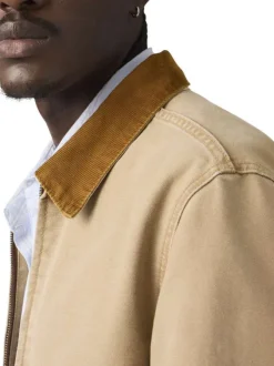Blouson en coton sable uni avec une coupe droite et un col chemise