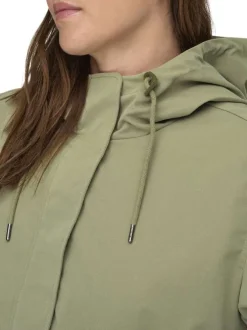 Blouson en coton vert à coupe cintrée pourvu d'un col à capuche