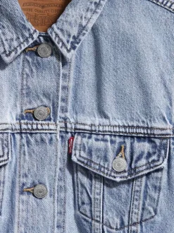 Blouson en jean bleu stone effet délavé avec un col à revers