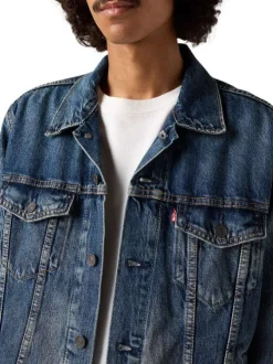 Blouson en jean en coton bleu uni avec un col à revers et des poches