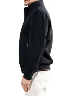 Blouson en nylon bleu marine uni zippé avec un col montant et des poches